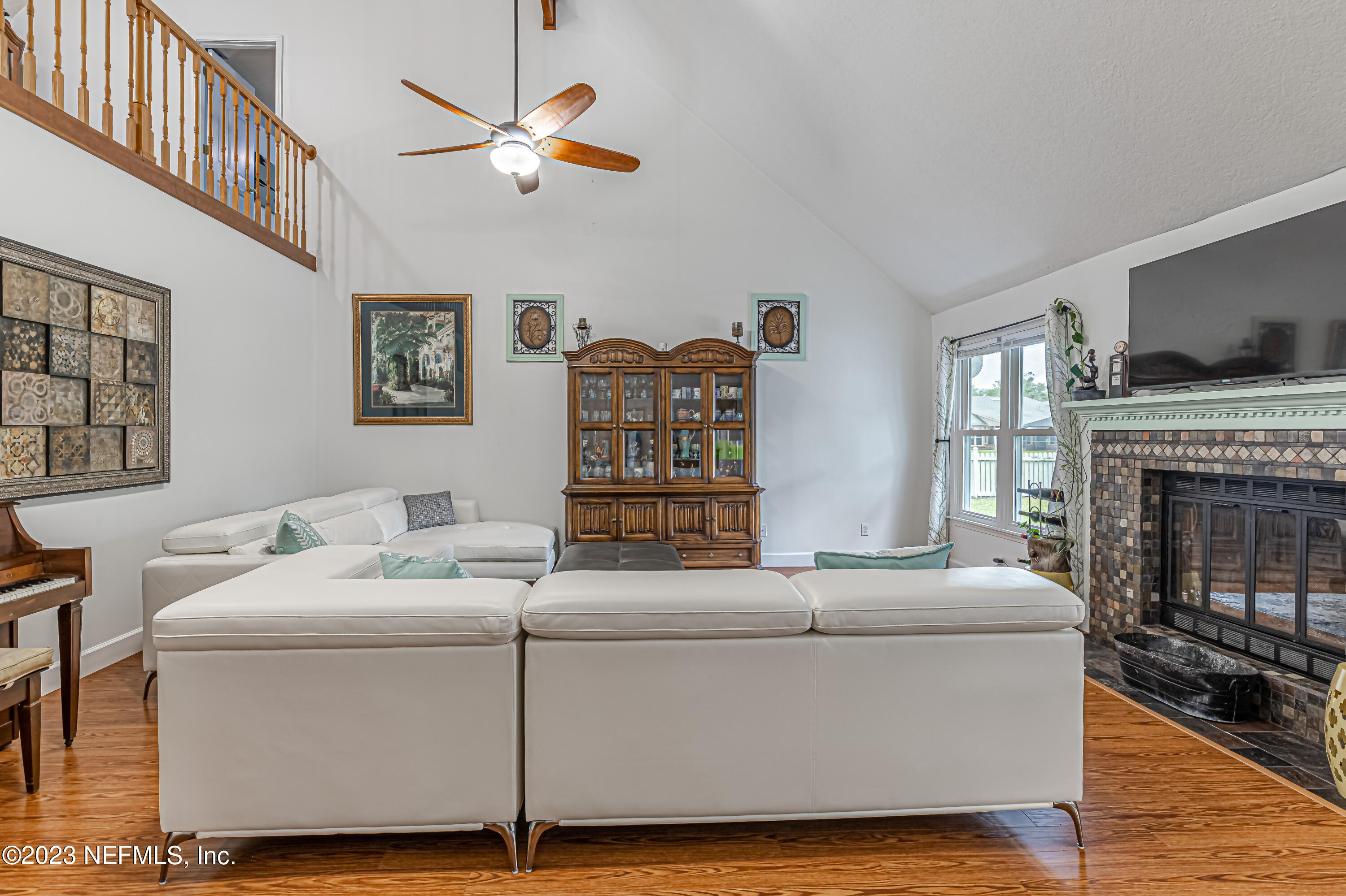 520 Roberts Road St. Johns, FL 32259 - Photo 17 of 81 a living room with furniture and a fireplace