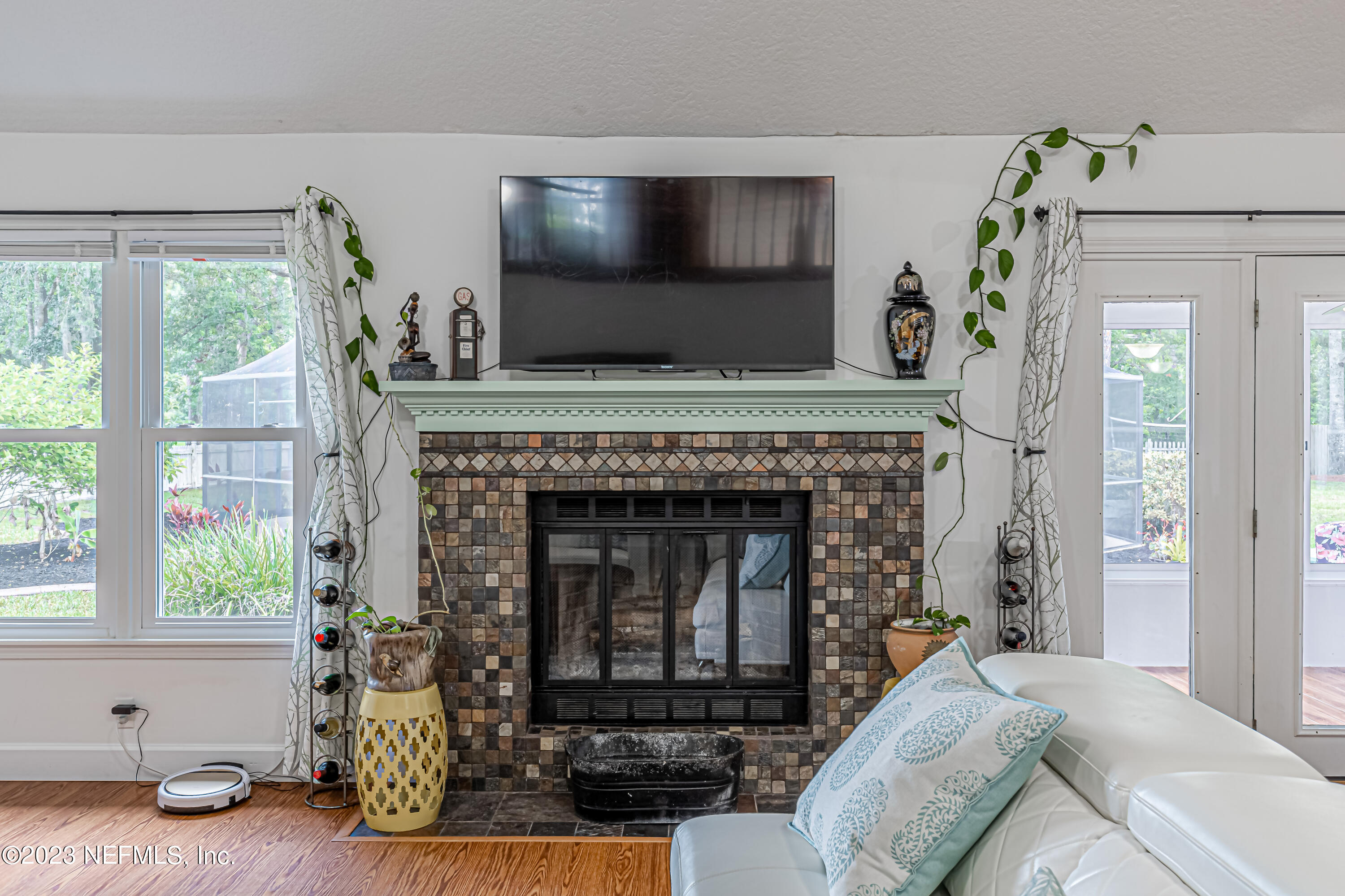 520 Roberts Road St. Johns, FL 32259 - Photo 19 of 81 a living room with furniture and a fireplace