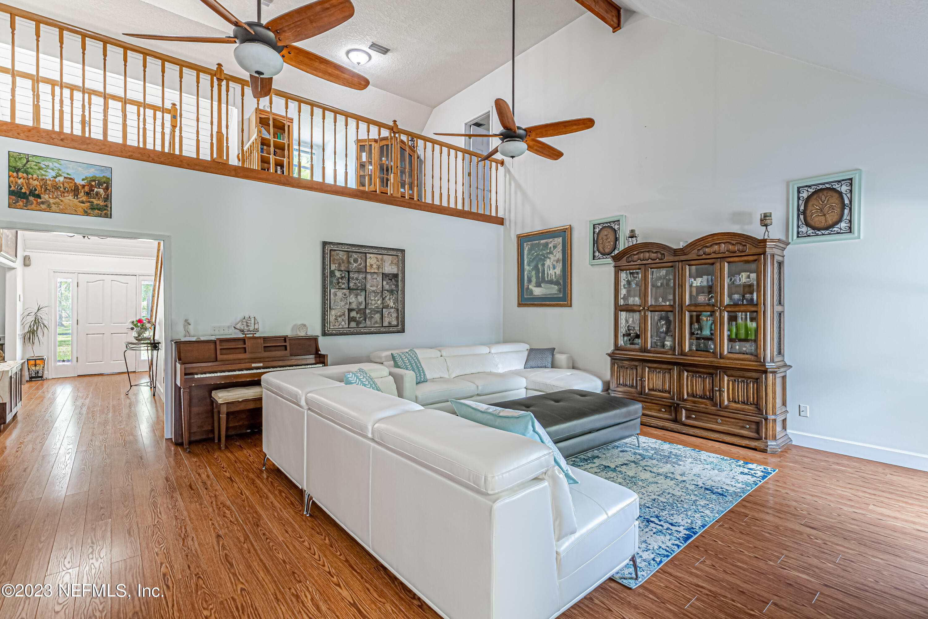 520 Roberts Road St. Johns, FL 32259 - Photo 21 of 81 a living room with furniture and a fireplace