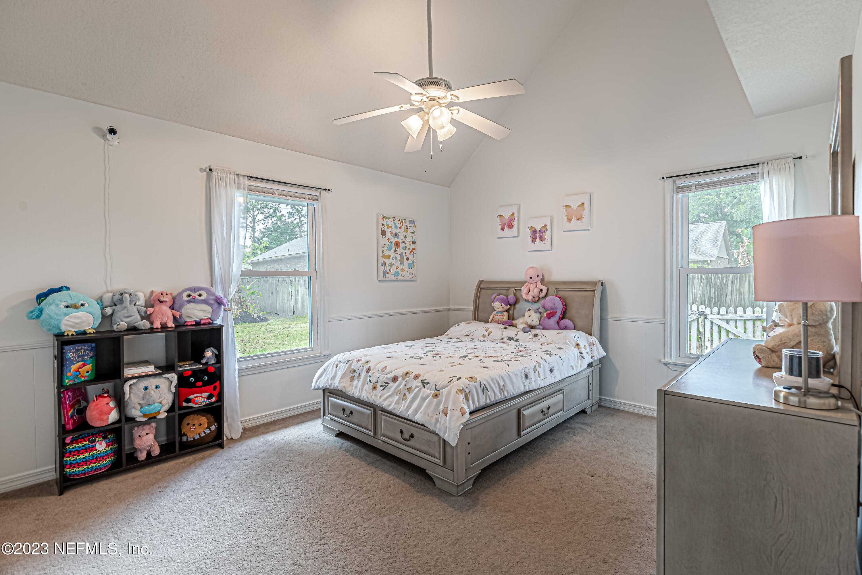520 Roberts Road St. Johns, FL 32259 - Photo 39 of 81 a bedroom with a bed a couch and dresser