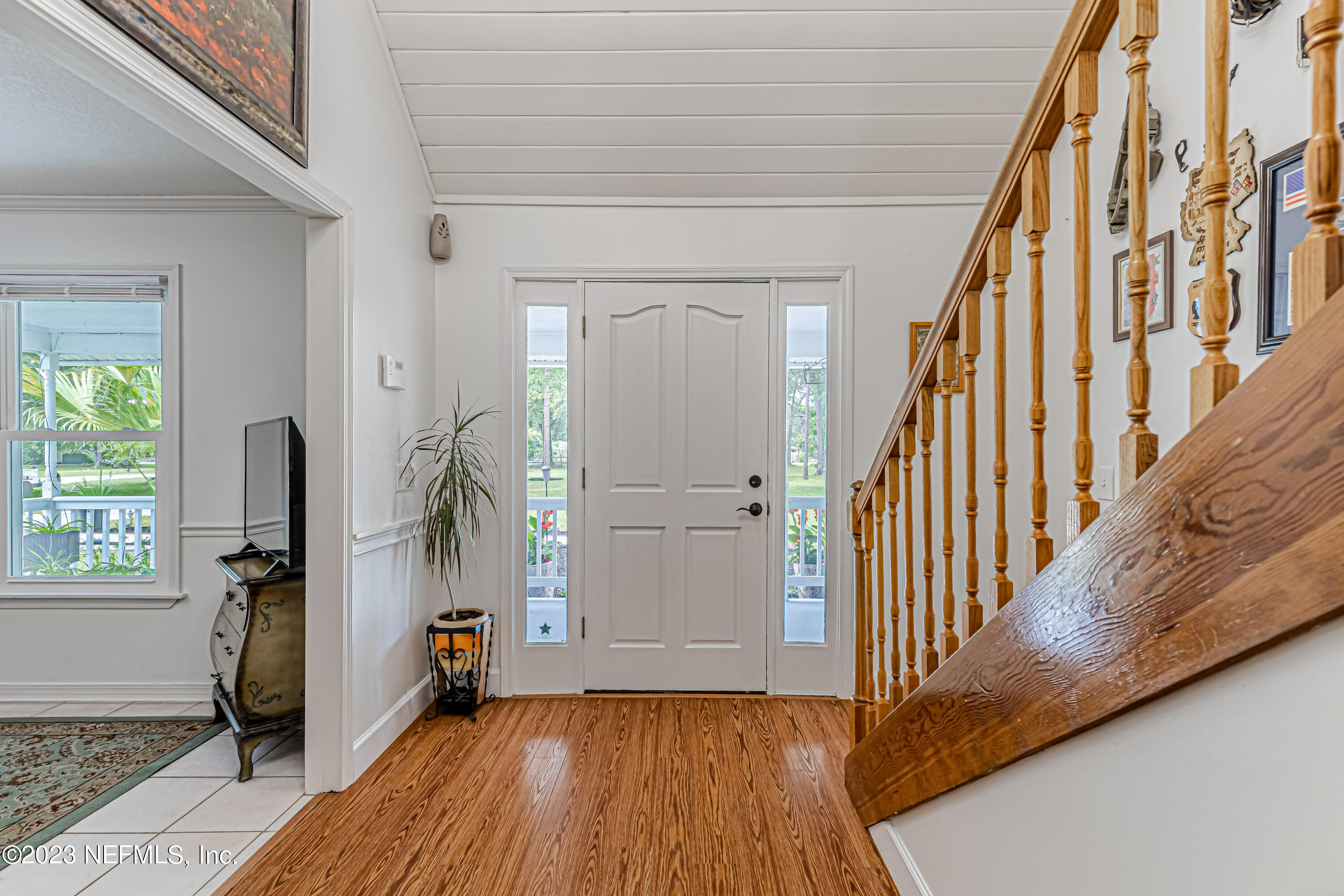 520 Roberts Road St. Johns, FL 32259 - Photo 4 of 81 a view of an entryway with wooden floor and stairs