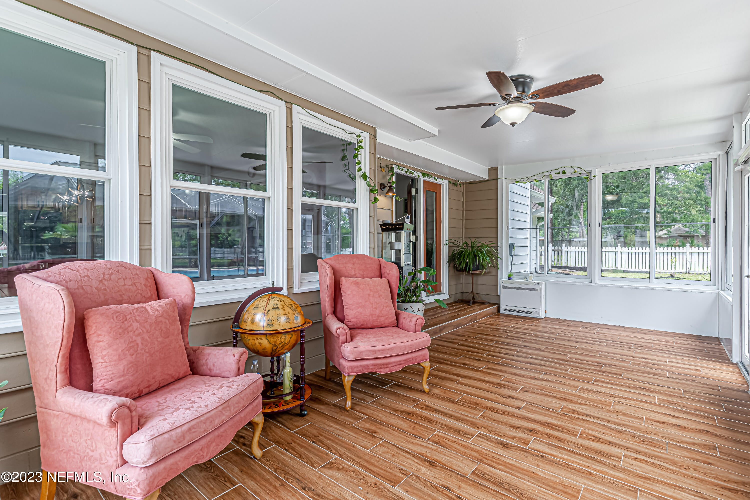 520 Roberts Road St. Johns, FL 32259 - Photo 44 of 81 a living room with furniture and a large window