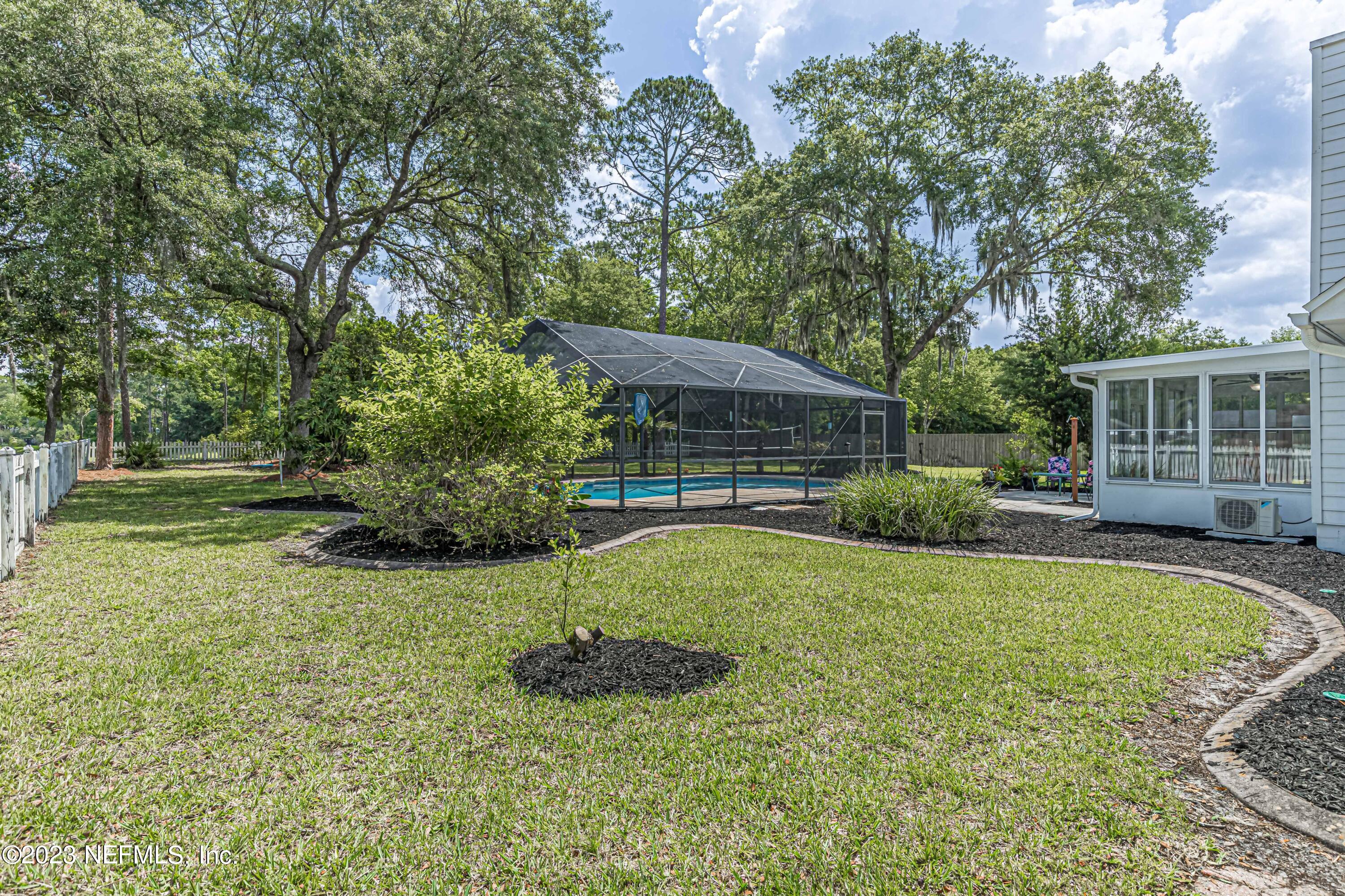 520 Roberts Road St. Johns, FL 32259 - Photo 56 of 81 a view of a house with backyard and sitting area