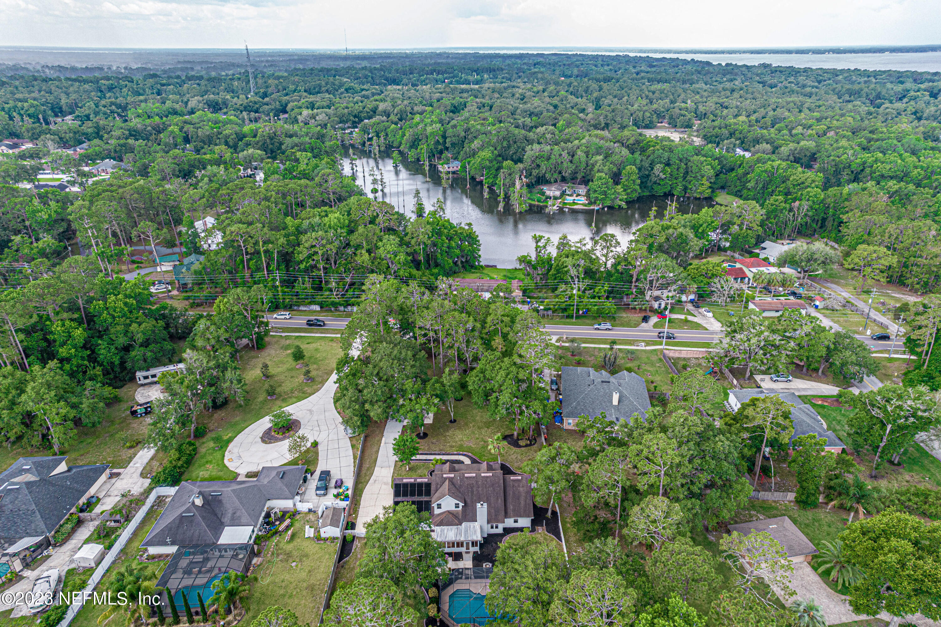 520 Roberts Road St. Johns, FL 32259 - Photo 70 of 81 an aerial view of a house with a yard and lake view