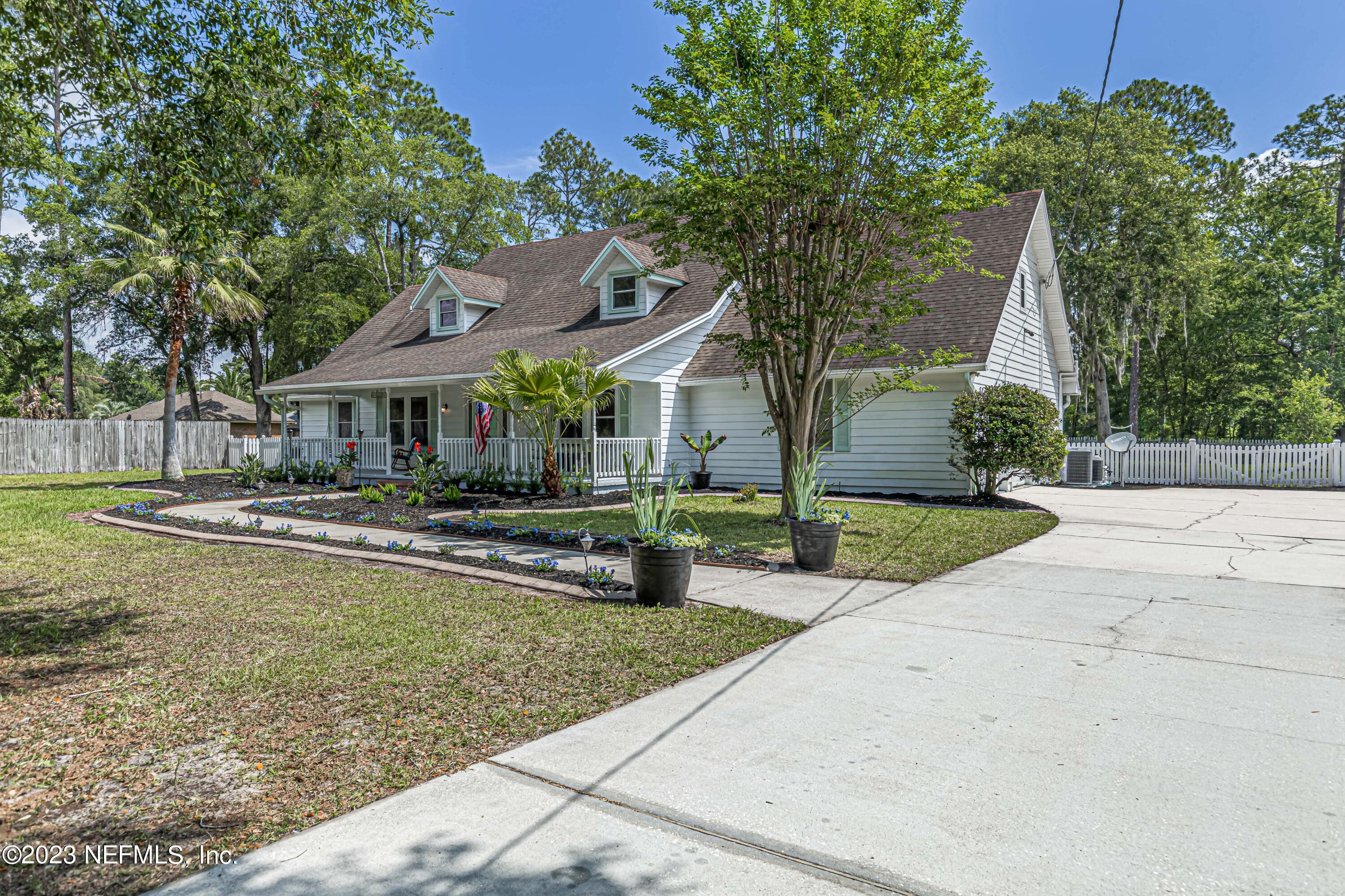 520 Roberts Road St. Johns, FL 32259 - Photo 80 of 81 a view of a house with swimming pool and a yard