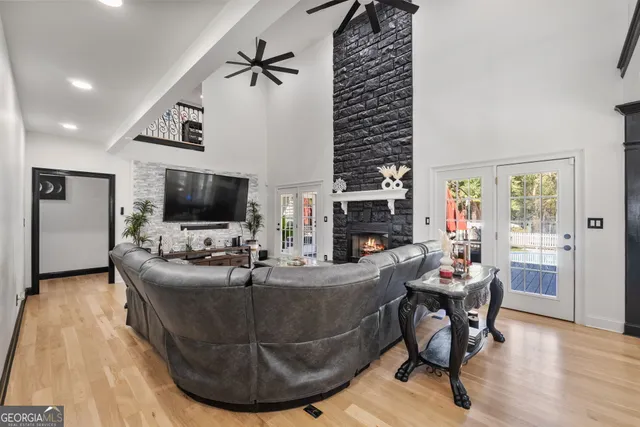a living room with furniture and a rug