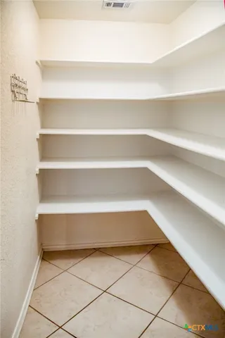 a view of a room with shelves