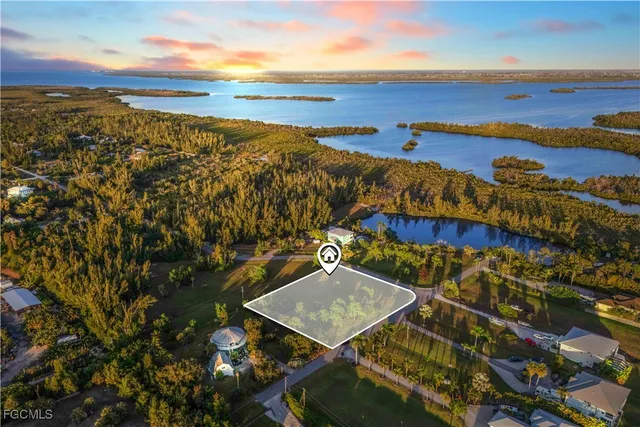 a view of a yard with an ocean