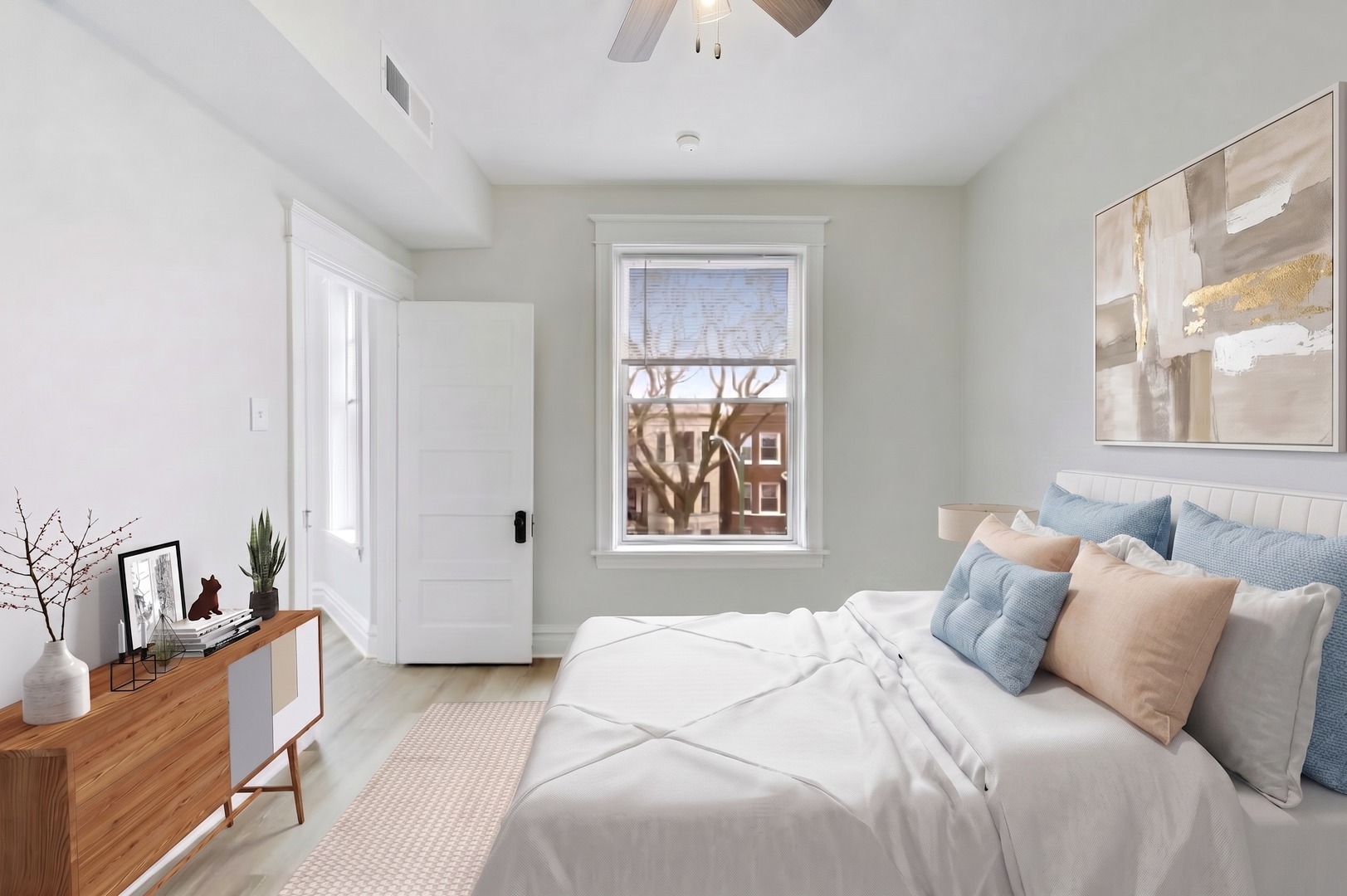 1646 West Byron Street, Unit 2F Chicago, IL 60613 - Photo 21 of 27 a bedroom with a bed and a window
