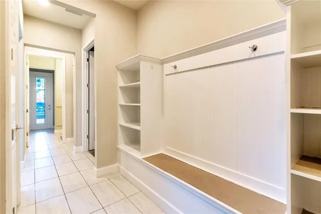 a bathroom with a shower and a bath tub