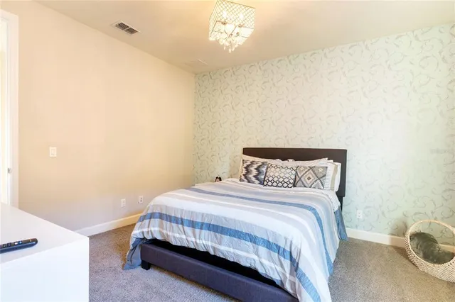 a view with cabinets a sink and a window