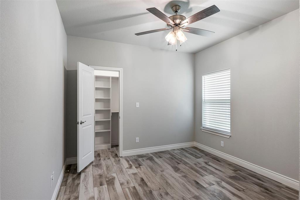 10301 Ravenswood Road Granbury, TX 76049 - Photo 33 of 38 Spacious bedroom