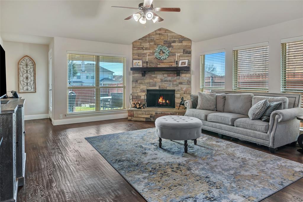 629 Fox View Drive Fort Worth, TX 76131 - Photo 14 of 38 a living room with furniture and a fireplace