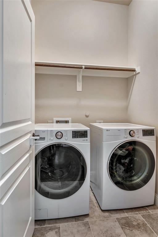 629 Fox View Drive Fort Worth, TX 76131 - Photo 27 of 38 a utility room with a washer and dryer