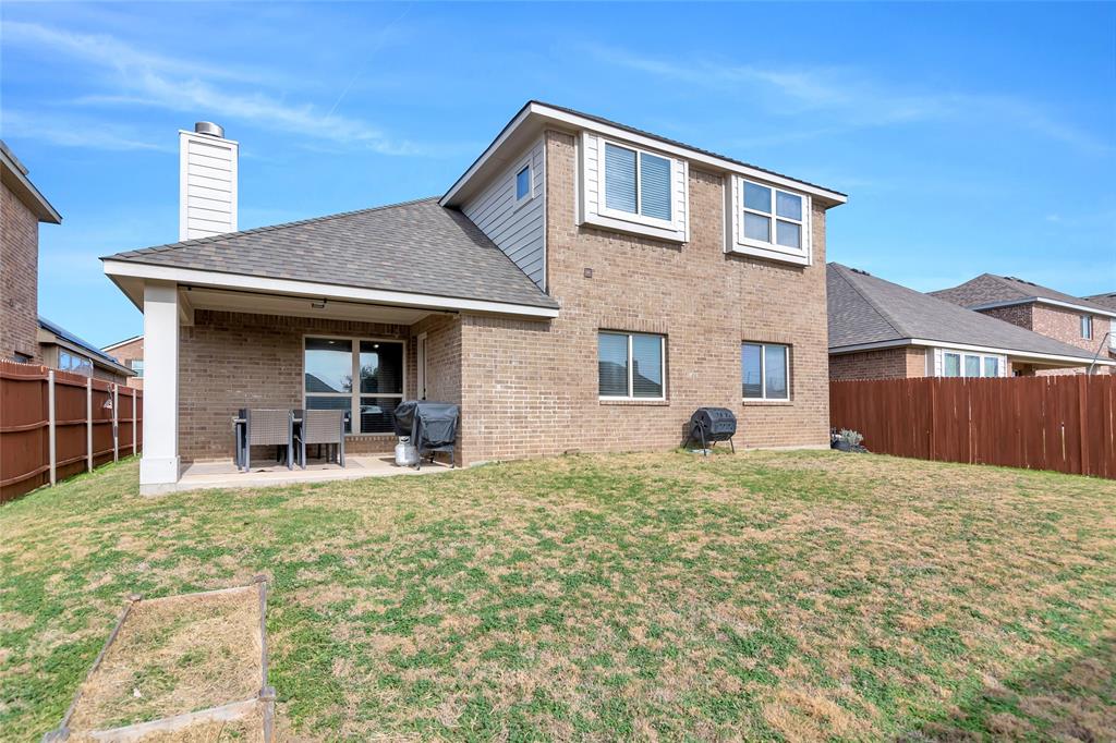 629 Fox View Drive Fort Worth, TX 76131 - Photo 33 of 38 a front view of a house with garden and porch