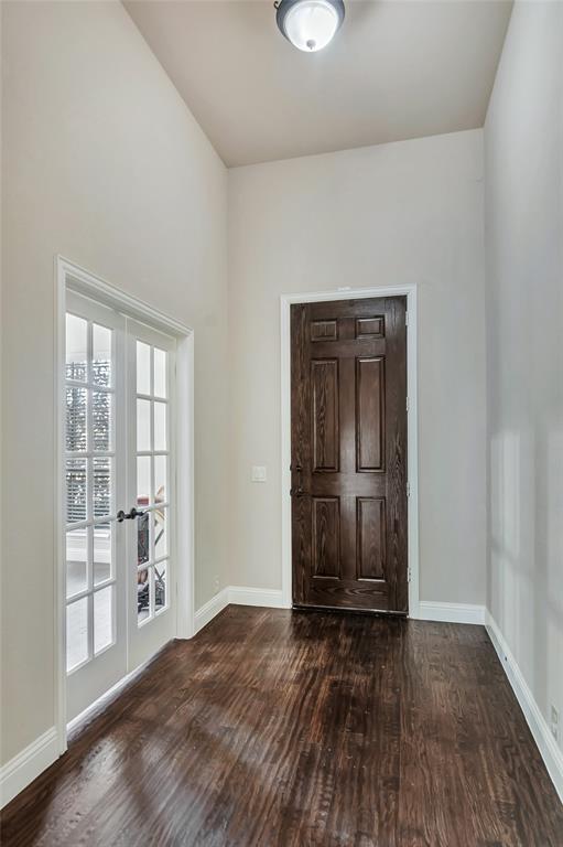 629 Fox View Drive Fort Worth, TX 76131 - Photo 5 of 38 wooden floor in an empty room with a window