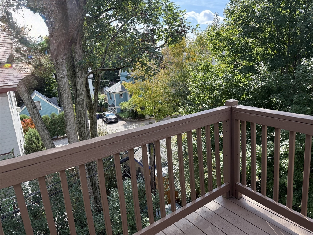 5 Brown, Unit 3 Boston, MA 02131 - Photo 7 of 7 a balcony with wooden floor and outdoor space