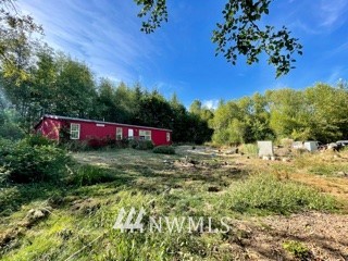 6217 East Grapeview Loop Road Allyn, WA 98524 - Photo 1 of 32 Gallery Image 1