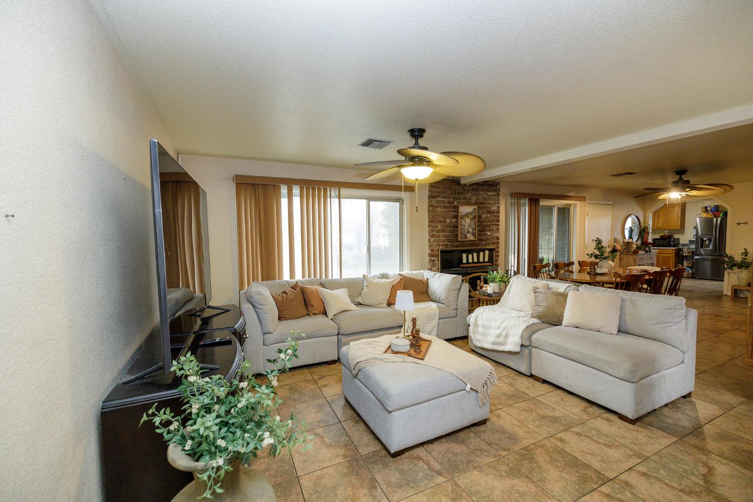 618 Wellsford Road Modesto, CA 95357 - Photo 9 of 26 a living room with furniture and a large window