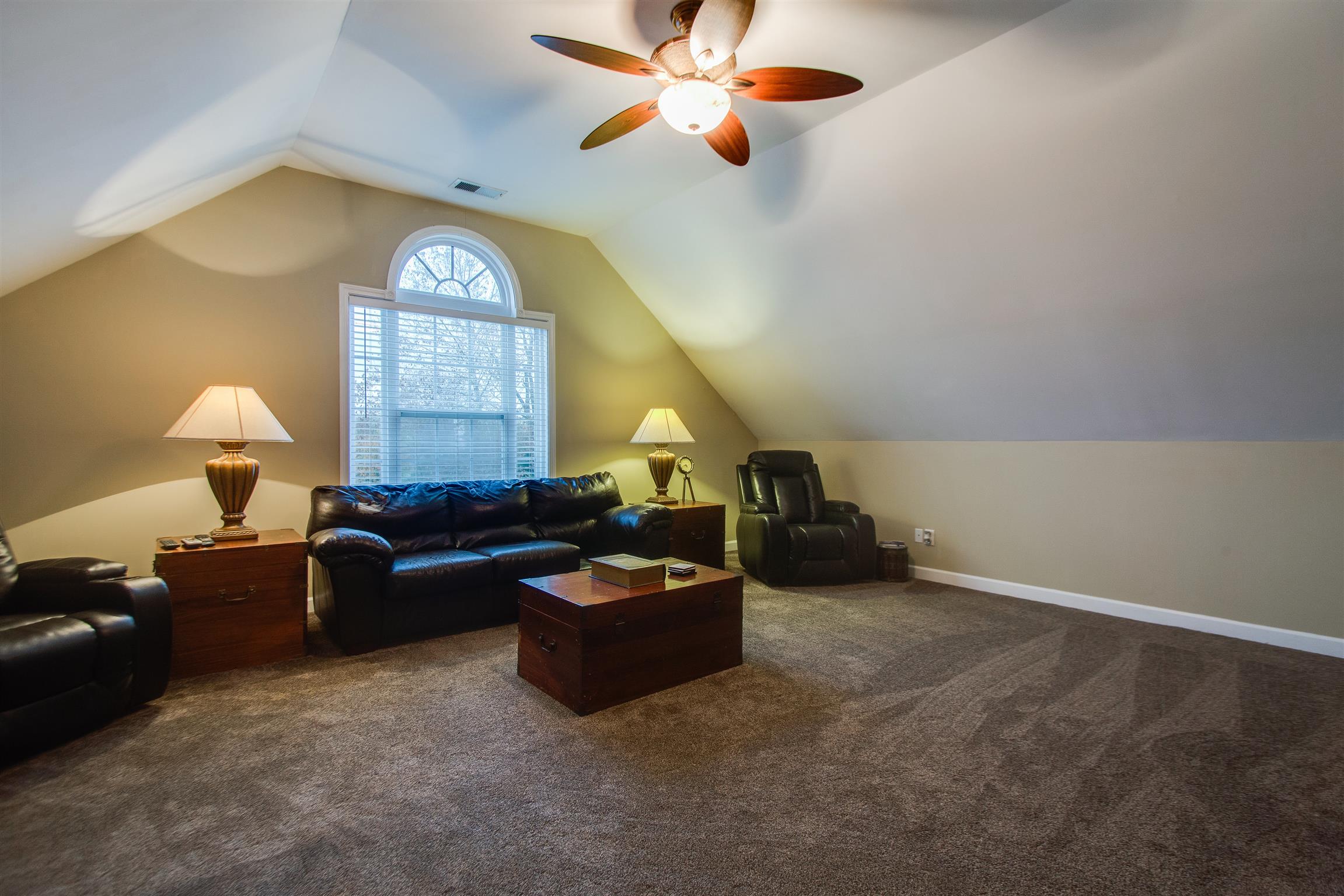 406 Reagan Road Mount Juliet, TN 37122 - Photo 19 of 23 What an amazing space for movies, games, or hanging out with family.