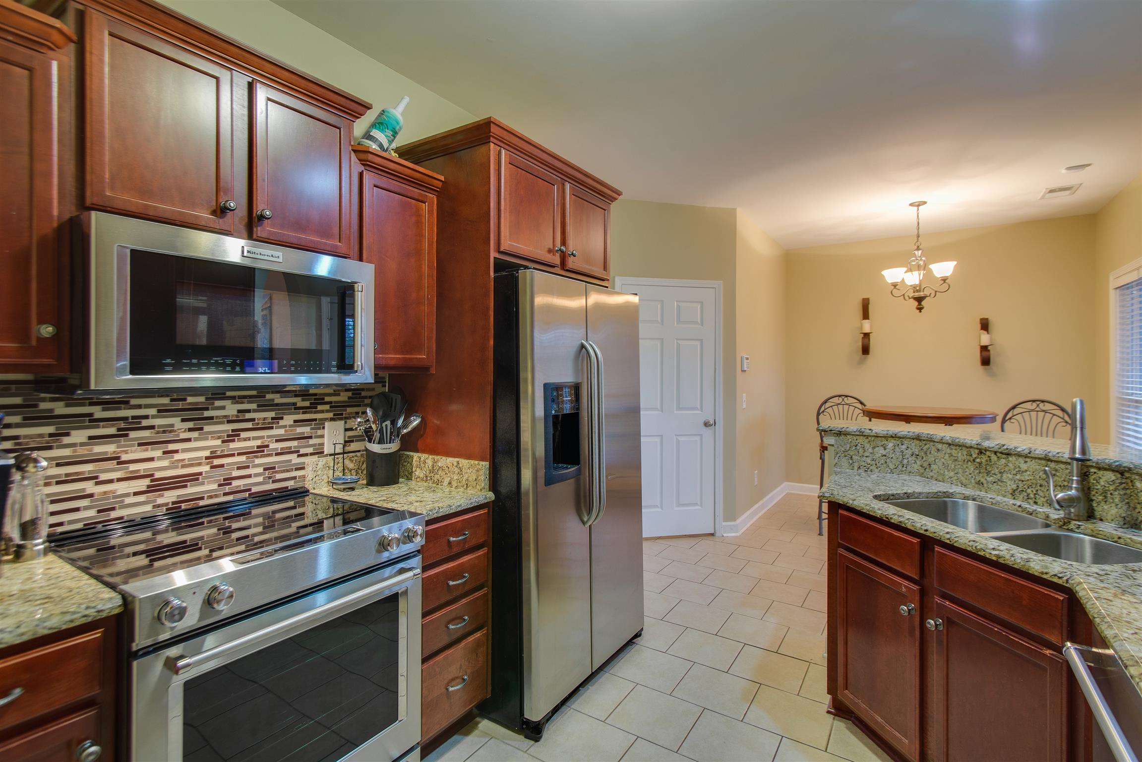 406 Reagan Road Mount Juliet, TN 37122 - Photo 10 of 23 Beautiful setup with granite and stainless steel appliances