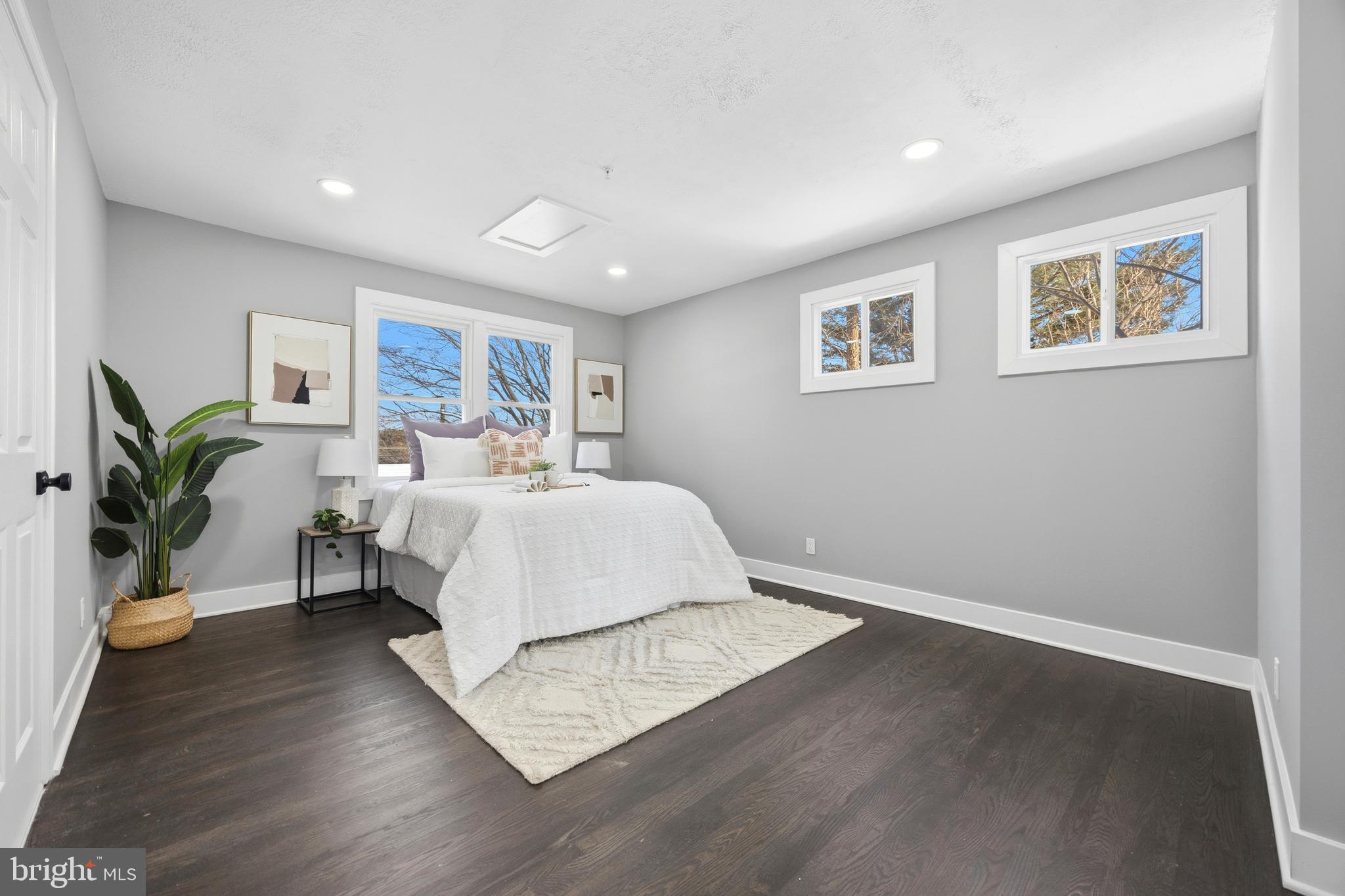 3170 Sykesville Road Westminster, MD 21157 - Photo 18 of 37 a bedroom with a bed and a potted plant