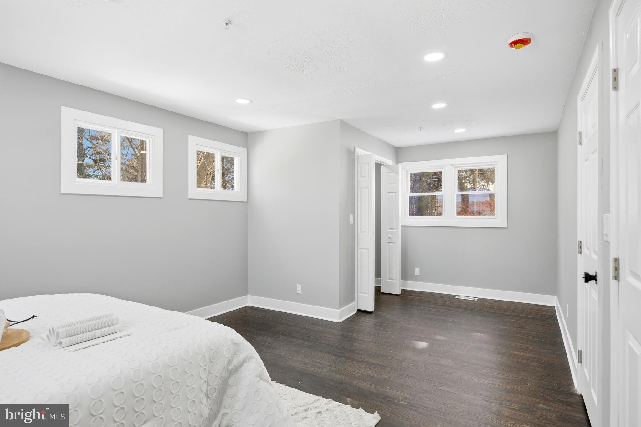 3170 Sykesville Road Westminster, MD 21157 - Photo 19 of 37 a bedroom with a bed and wooden floor