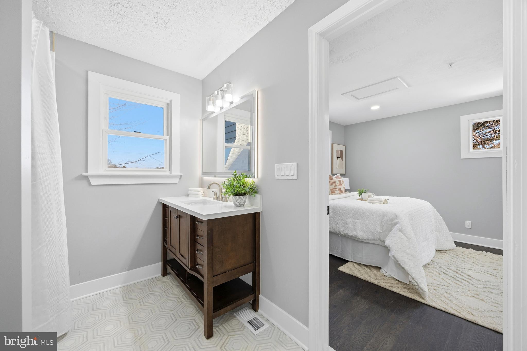 3170 Sykesville Road Westminster, MD 21157 - Photo 20 of 37 a room with a bed and paintings on the wall