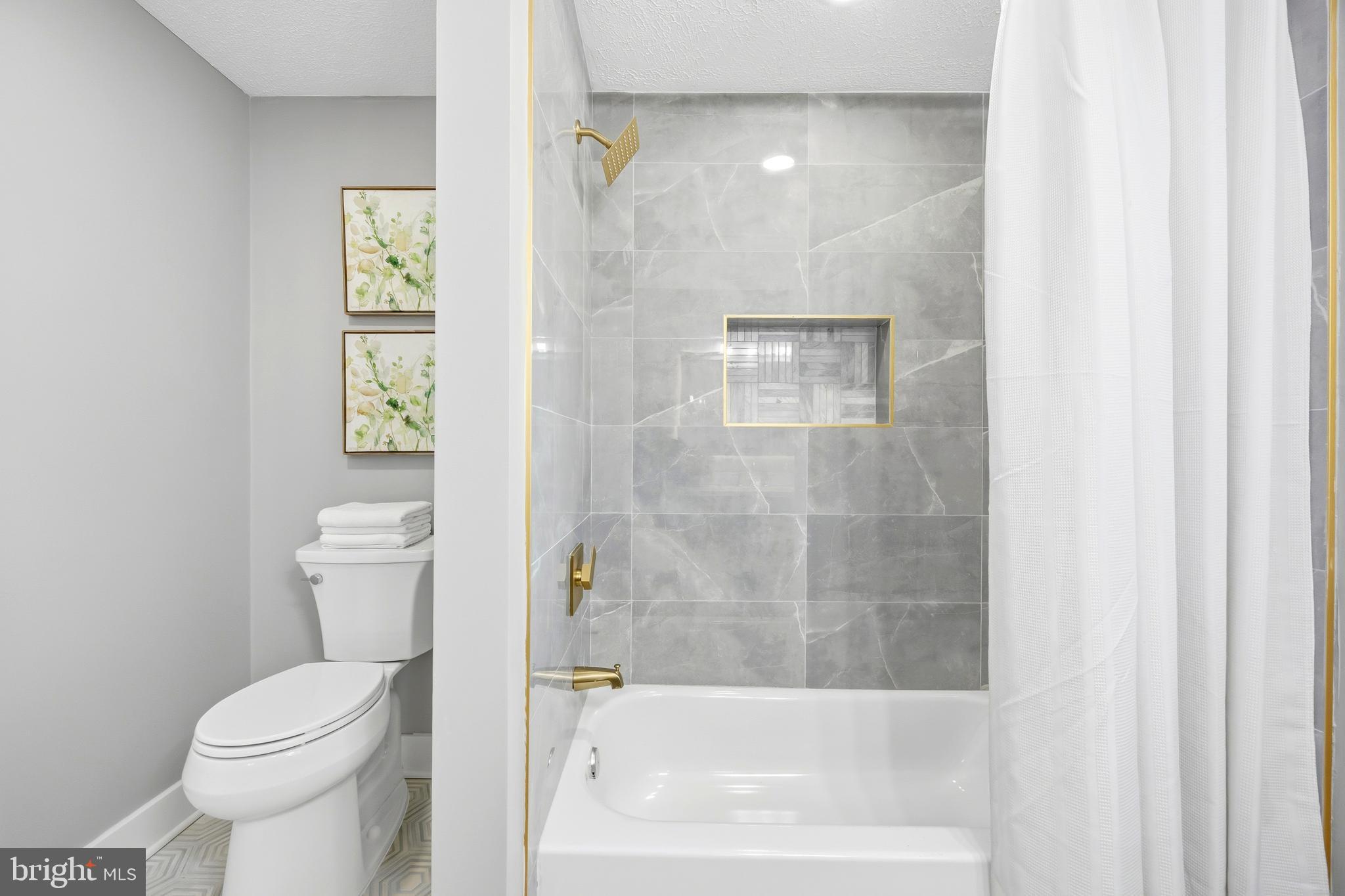 3170 Sykesville Road Westminster, MD 21157 - Photo 21 of 37 a bathroom with a toilet and a shower