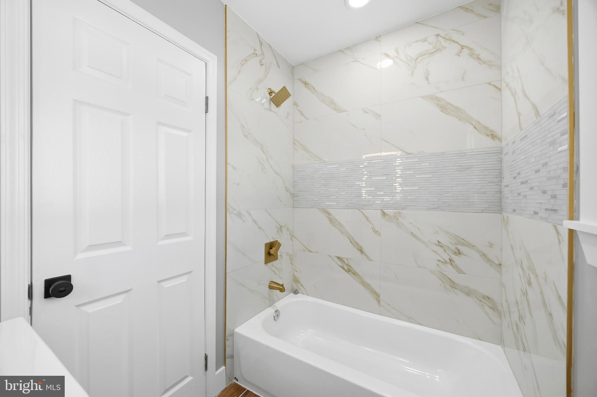 3170 Sykesville Road Westminster, MD 21157 - Photo 25 of 37 a bathroom with a bathtub and shower