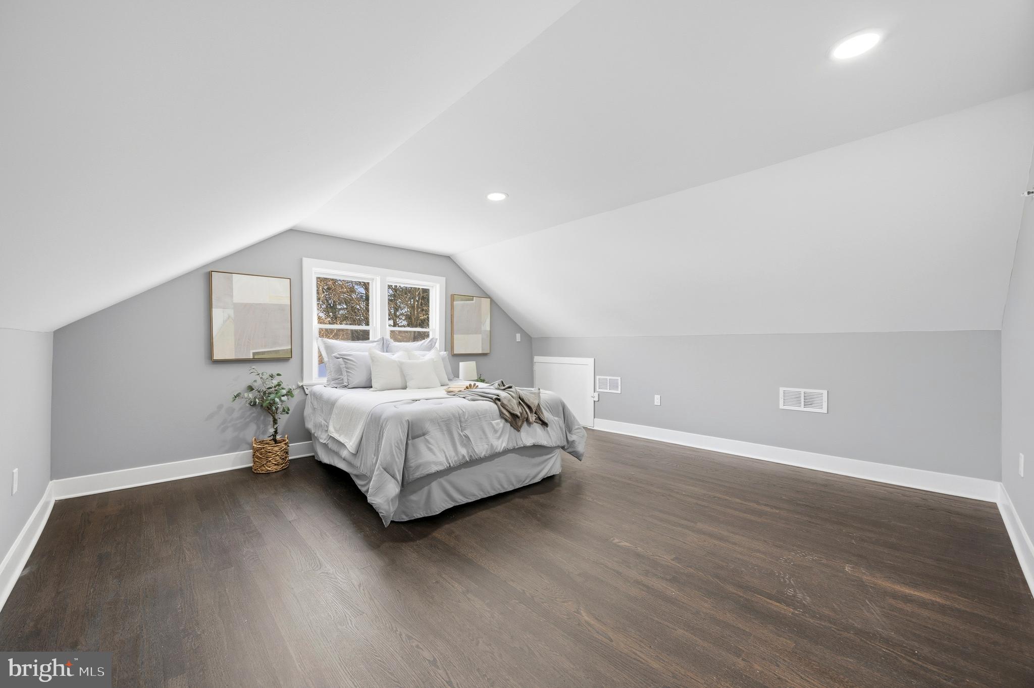 3170 Sykesville Road Westminster, MD 21157 - Photo 26 of 37 a spacious bedroom with a bed and wooden floor