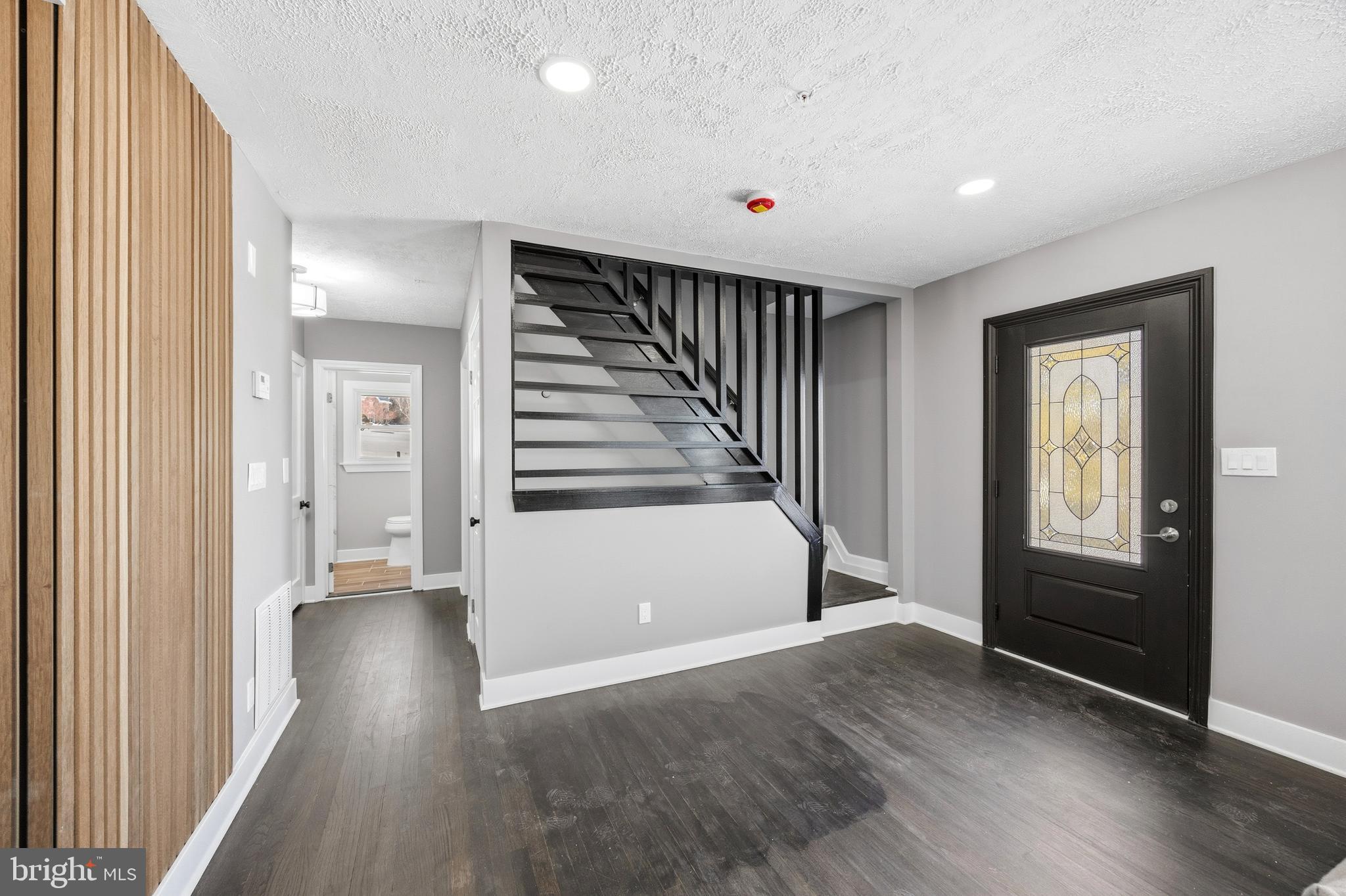 3170 Sykesville Road Westminster, MD 21157 - Photo 3 of 37 wooden floor in an empty room with a window
