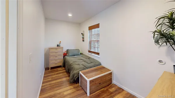 a bed room with a bed and a couch