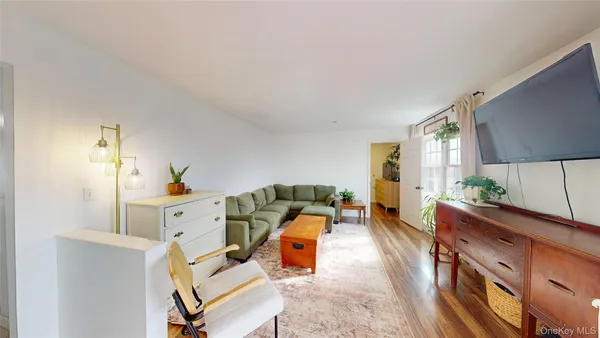 a living room with furniture and a table