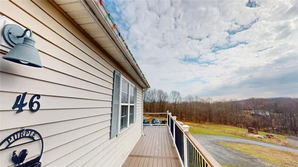 a view of a house with a deck
