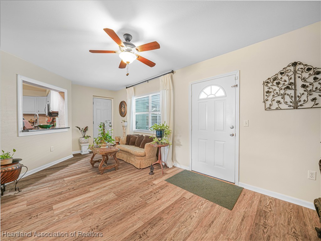 5342 Lime Road Sebring, FL 33875 - Photo 16 of 47 PARLOR DOOR LEADS TO POOL AND POOL HOUSE