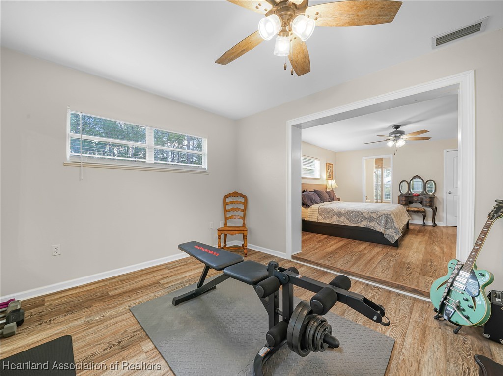 5342 Lime Road Sebring, FL 33875 - Photo 20 of 47 GYM OFF PRIMARY BEDROOM