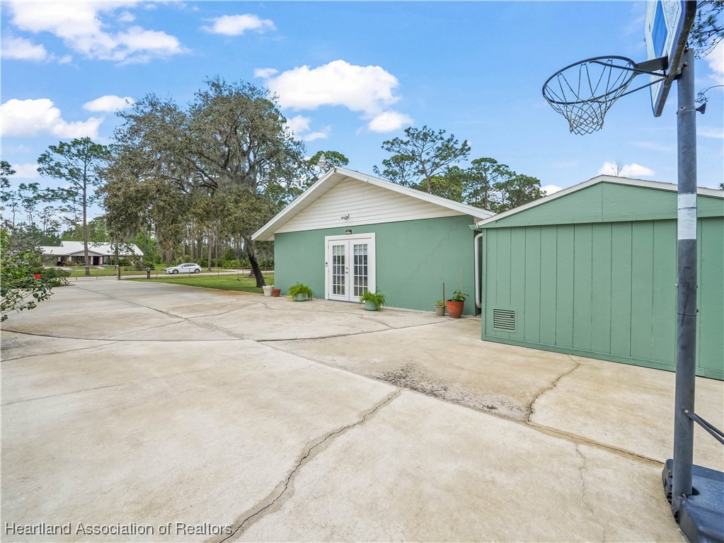 5342 Lime Road Sebring, FL 33875 - Photo 33 of 47 FRONT OF MOTHER IN LAW SUITE BUILDING SITS BESIDE SHED