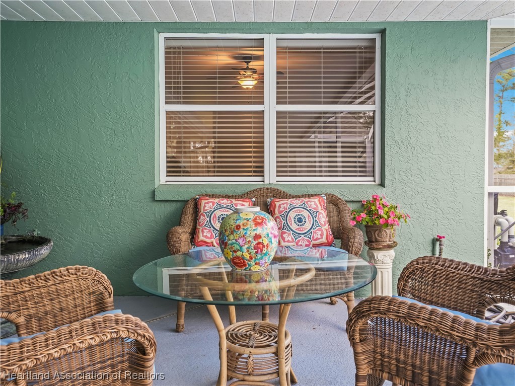 5342 Lime Road Sebring, FL 33875 - Photo 43 of 47 PORCH WITHIN SCREENED POOL AREA
