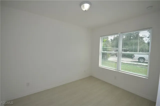 an empty room with window