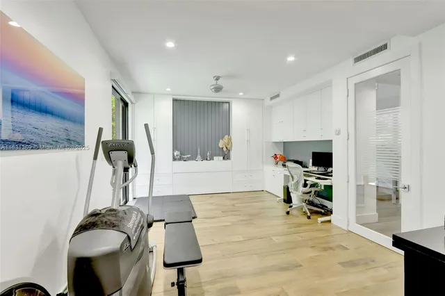 a view of a kitchen with furniture and a window