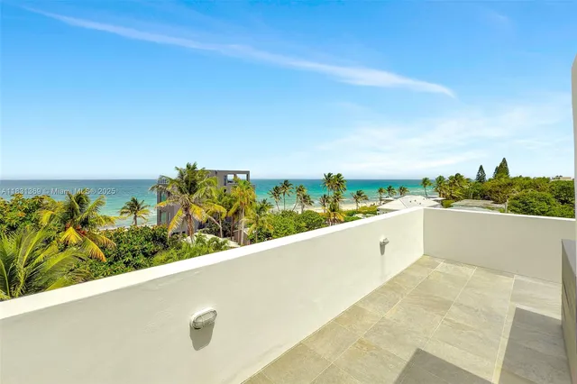 a view of a balcony with city view