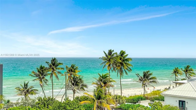 a view of a city street from a balcony
