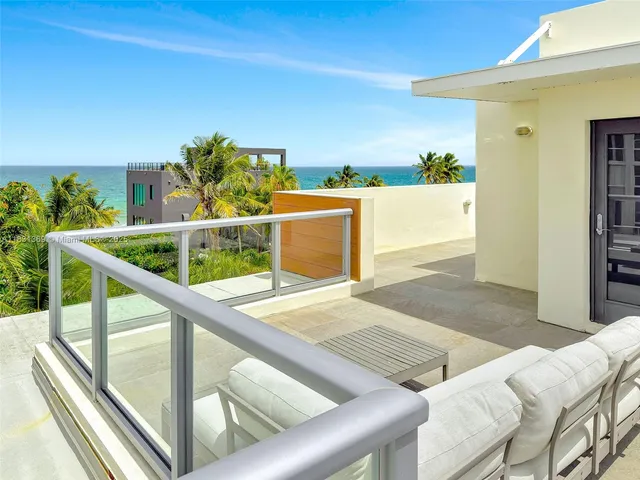 a view of a backyard with plants