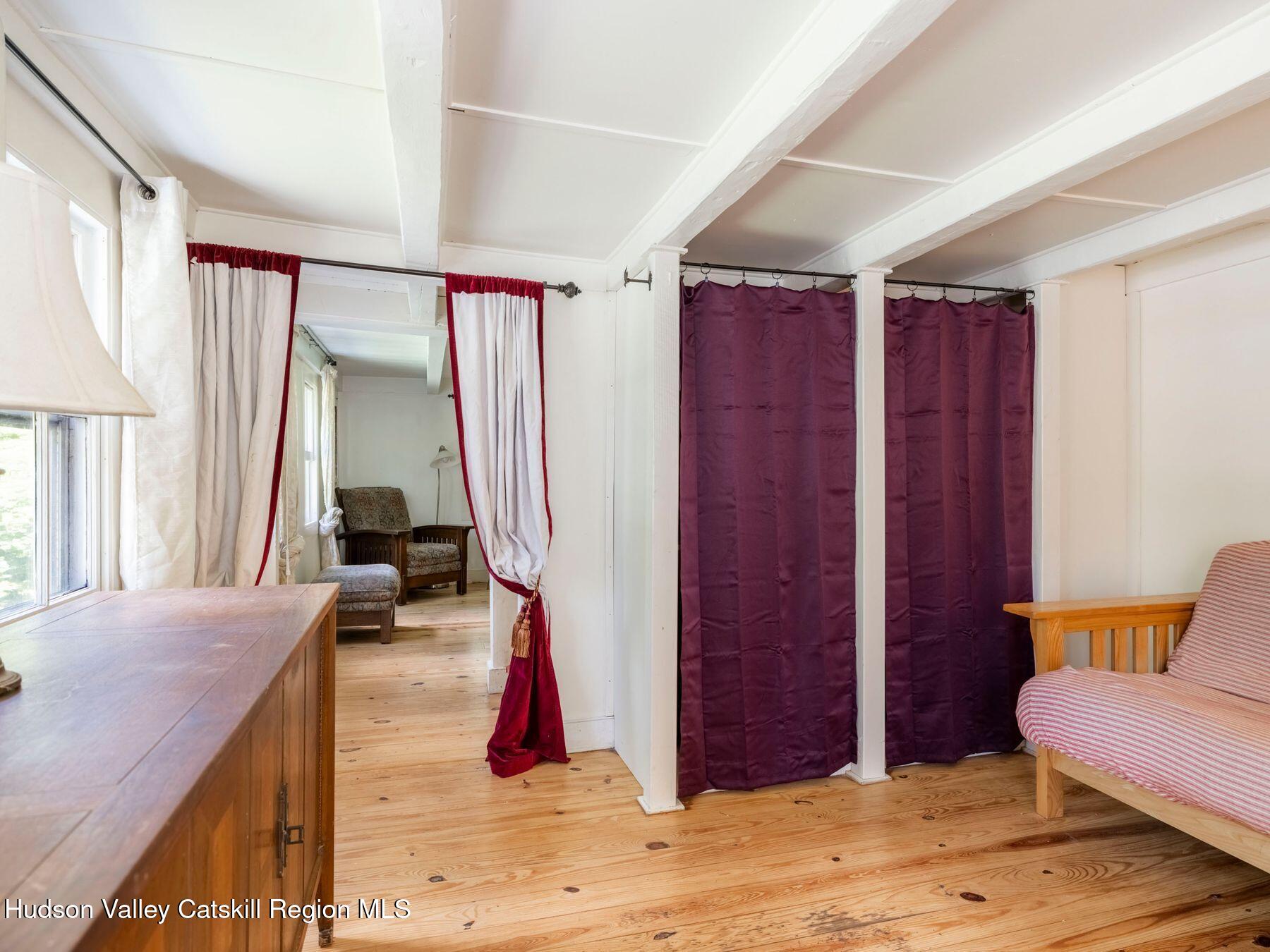 452 County Road 2 Accord, NY 12404 - Photo 23 of 45 a bed room with a bed and a chair