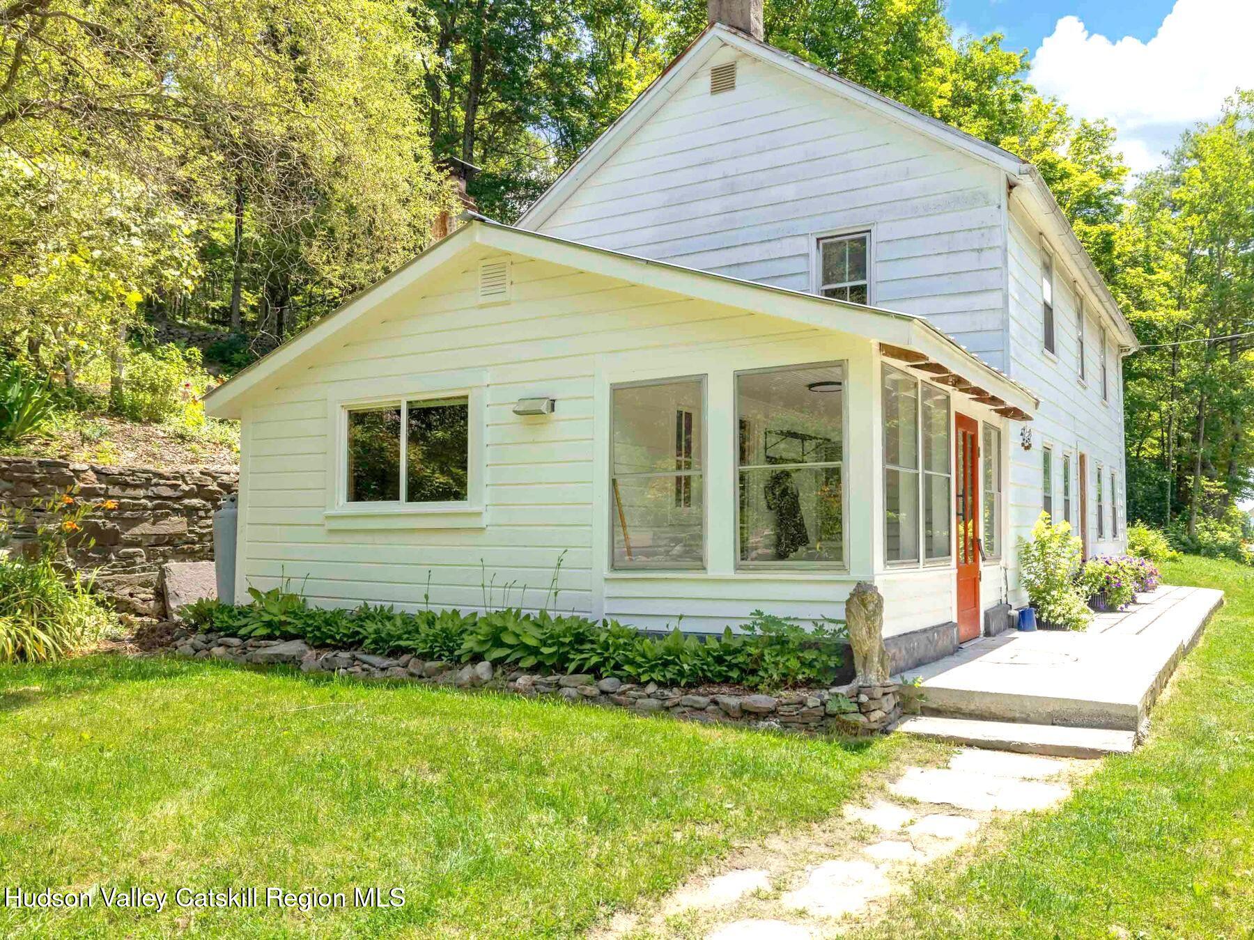 452 County Road 2 Accord, NY 12404 - Photo 44 of 45 a view of a house with backyard and garden