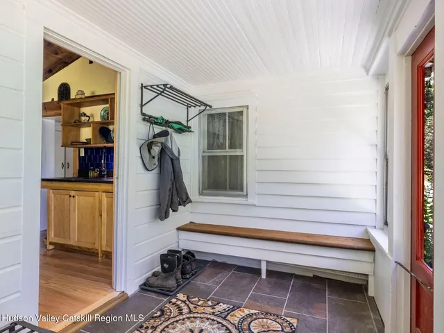 a bathroom with a sink and a window