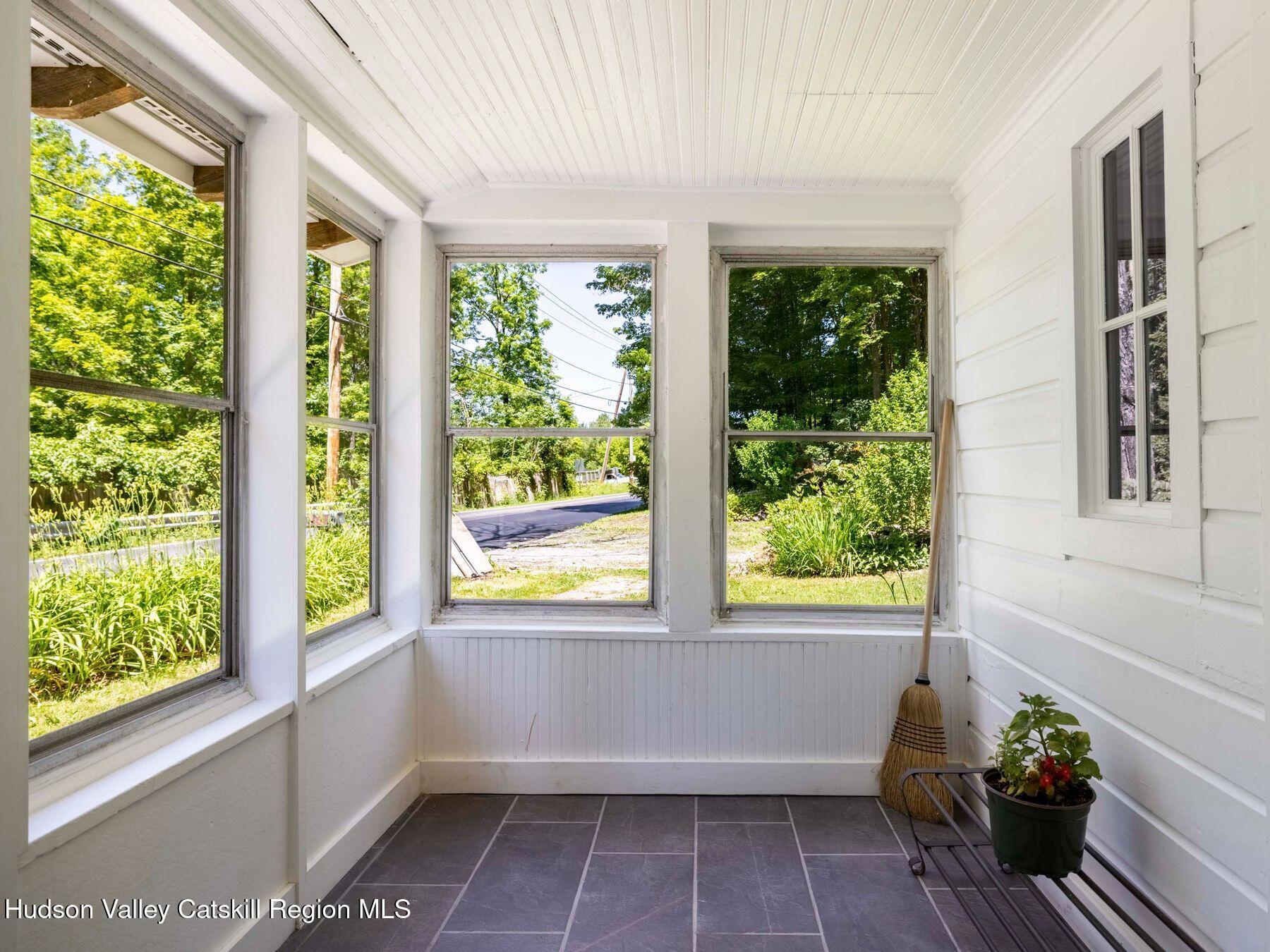 452 County Road 2 Accord, NY 12404 - Photo 9 of 45 a view of a room that has a window and a potted plant