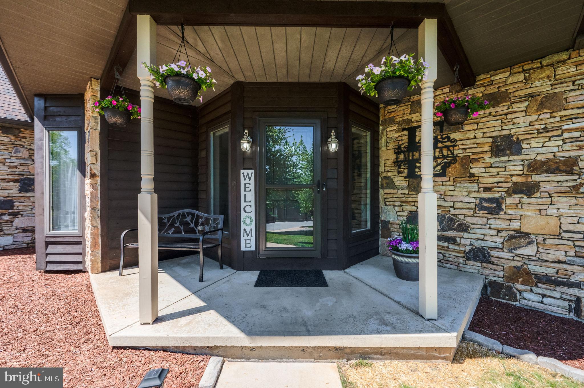 24 Sycamore Drive Reading, PA 19606 - Photo 2 of 56 Covered front porch. Stone and Cedar details.