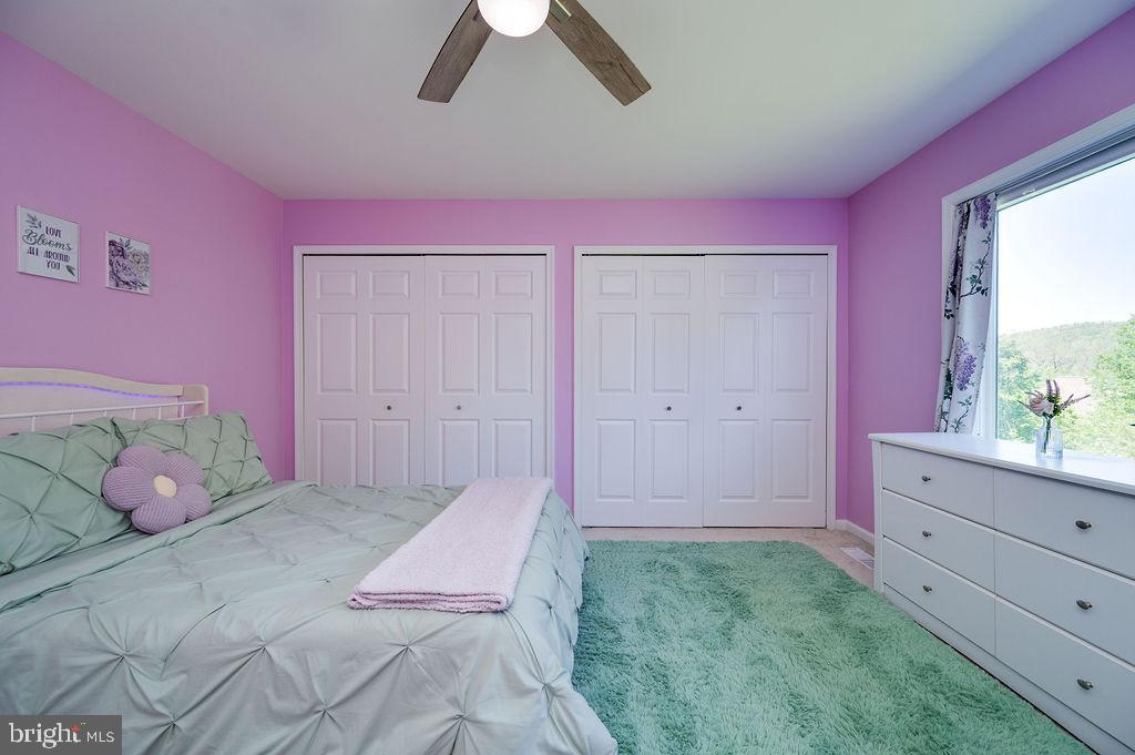 24 Sycamore Drive Reading, PA 19606 - Photo 37 of 56 a bedroom with a bed and a dresser